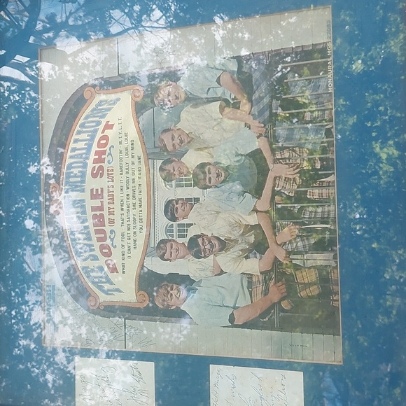 Signed Copy of Tge Swingin Medallions